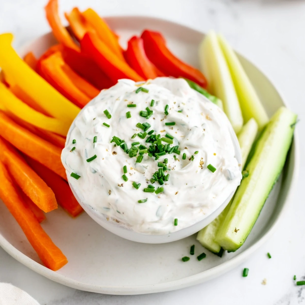 Creamy Kids Dip with ranch and veggies: imagine colorful sticks for dipping pleasure.