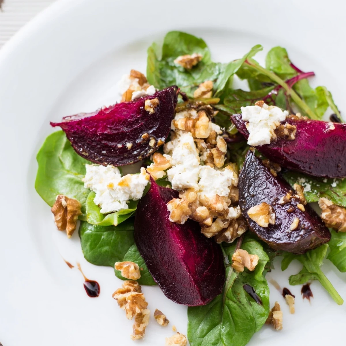 This delicious beet and goat cheese salad features sweet beets and crunchy walnuts; serve chilled.