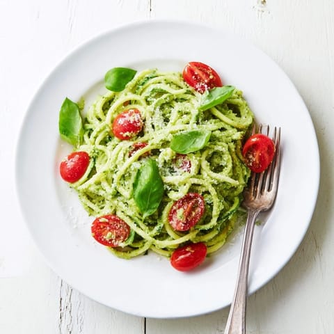 Fresh basil and garlic aroma rising from the pasta, ready to serve with a lemony twist in the light meal.  